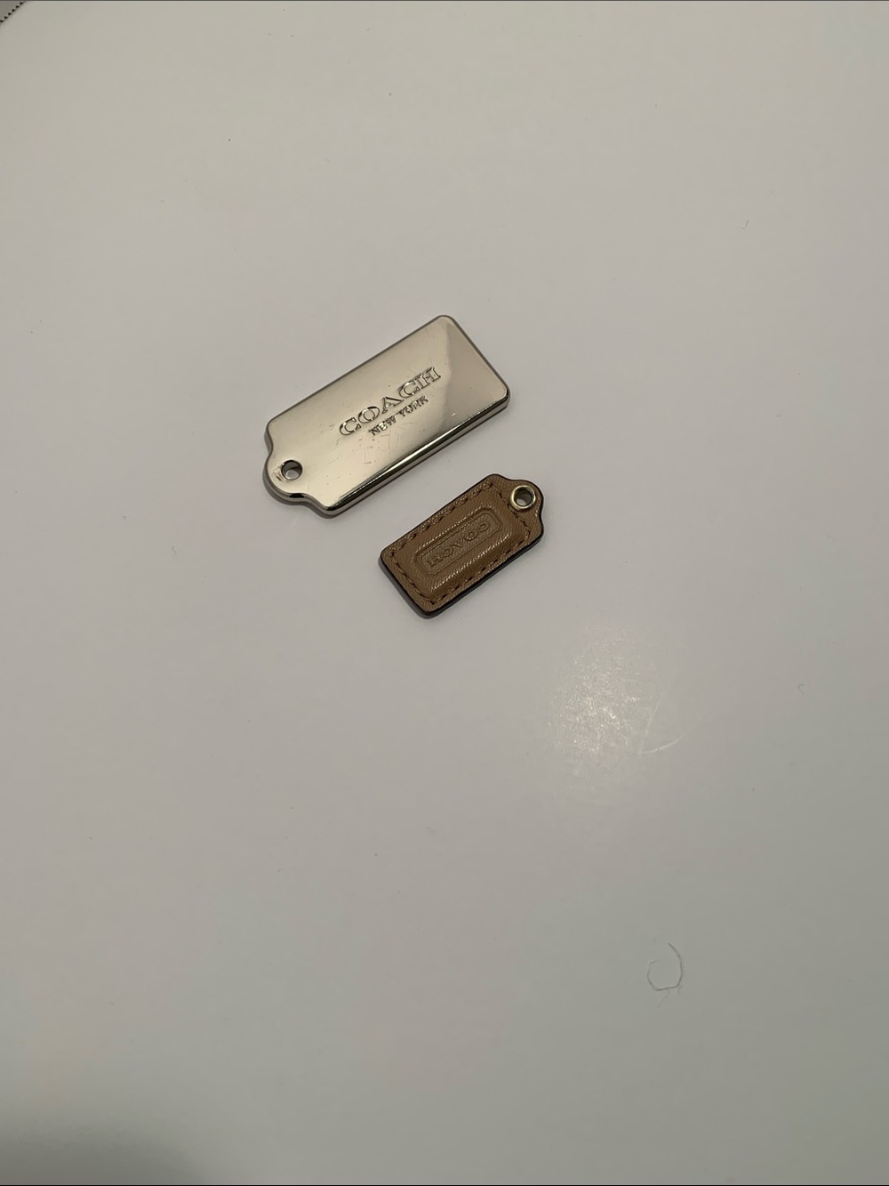 Coach Silver Metal Tag with Brown Leather Mini Charm
